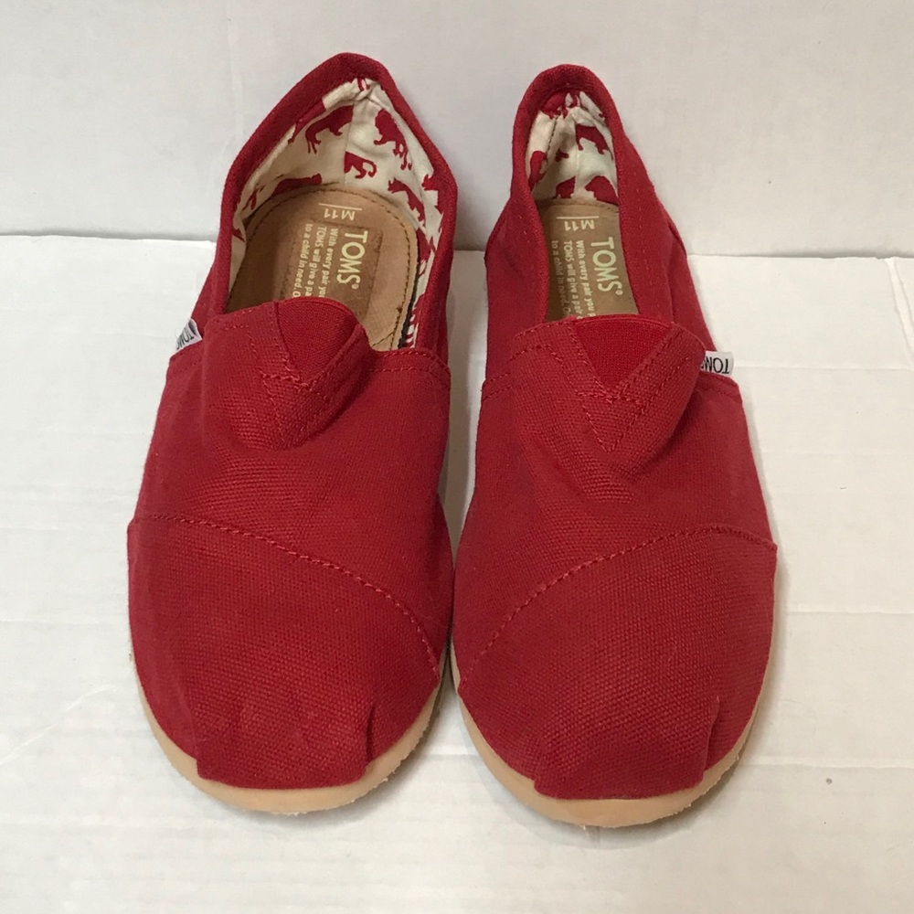 Red TOMS Slip-ons 150911